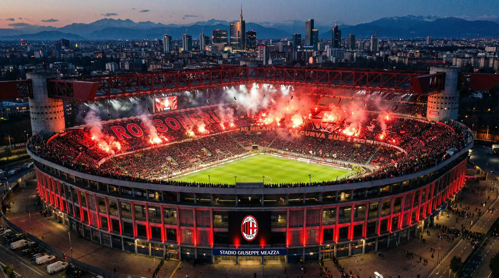 Estadio San Siro con colores rojiblanco del AC Milan de noche
